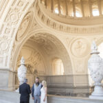 A photo of a couple getting married in San Francisco City Hall under the Rotunda Dome