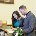 A photo of a couple applying for their marriage License