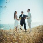 A photo of a couple having their Elopement by the Sea