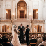 A photo of a couple's Wedding on the Mayor's Balcony at San Francisco City Hall