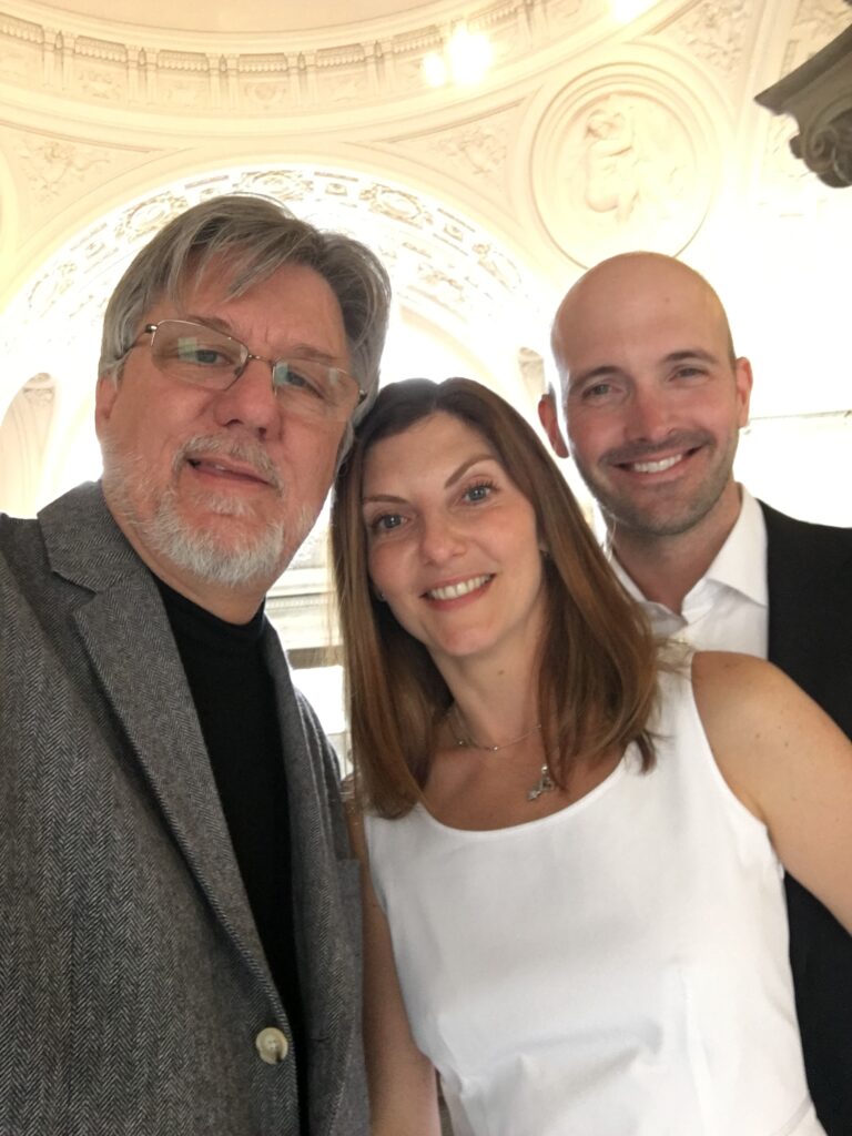 A photo of the Officiant and the couple taking an Elopement Selfie at San Francisco City Hall