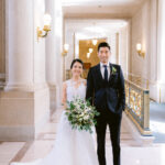 Bride and Groom on the upstairs balcony San Francisco City Hall