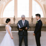 Bride and Groom on the fourth floor gallery San Francisco City Hall