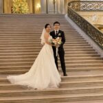 Bride and Groom on the Grand Staircase City Hall at Christmas time