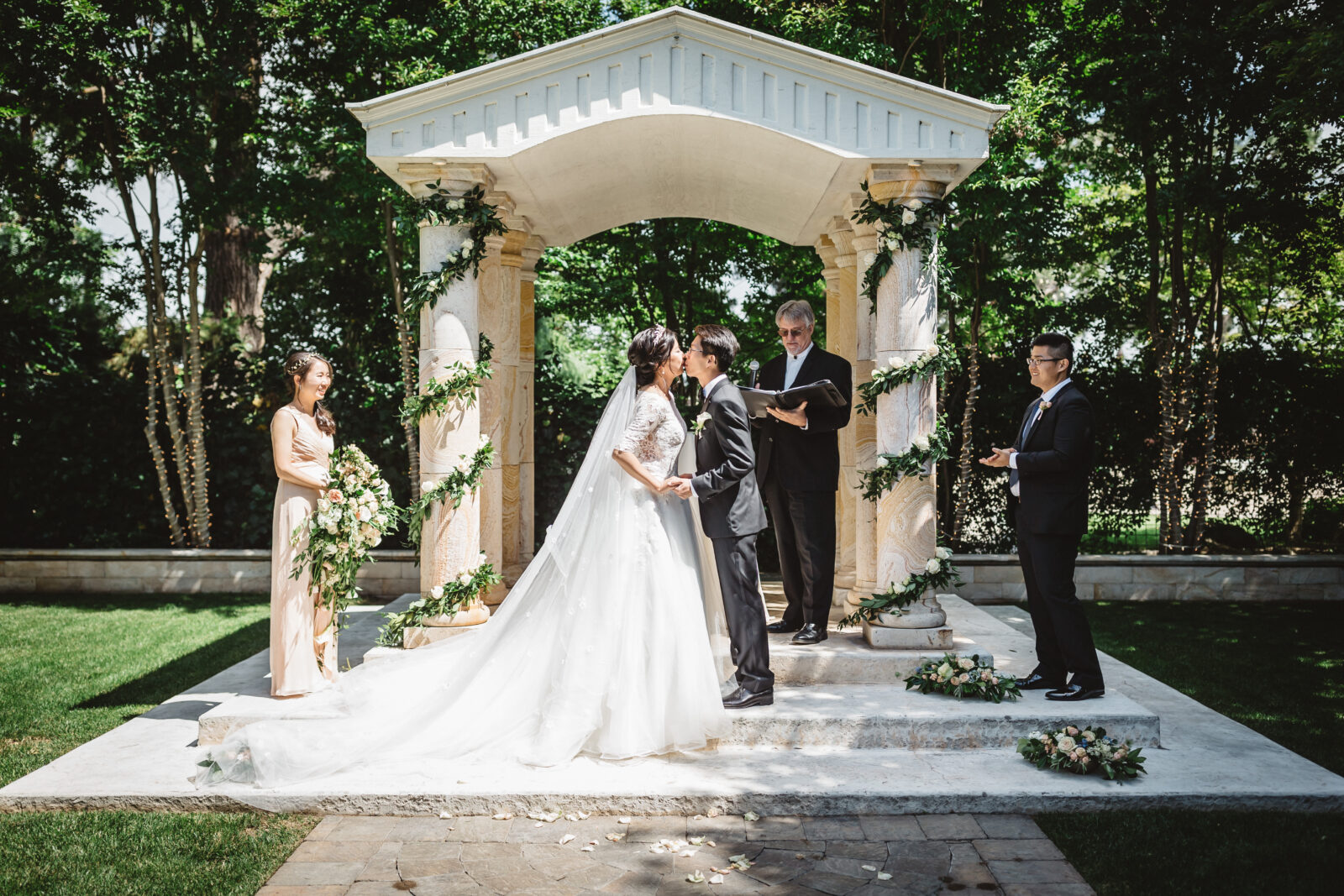 Bride and Groom exchanging thier first kiss